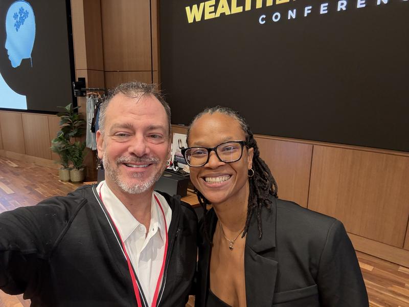 Christopher Laurent with a fellow attendee at a conference