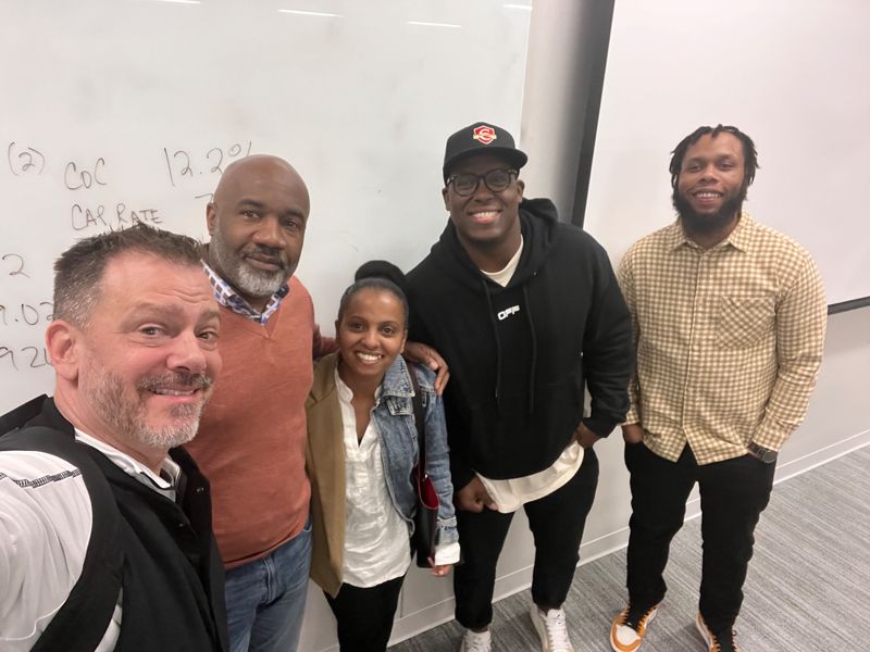 Christopher Laurent with real estate development students after class